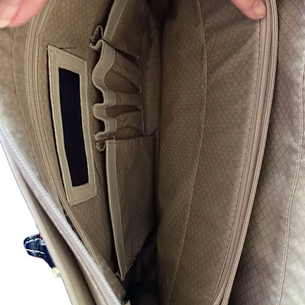 McLein leather computer bag well loved but has lots of life in it small area of